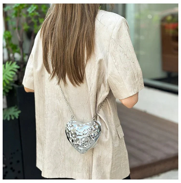 Beaten Heart Sling Bag