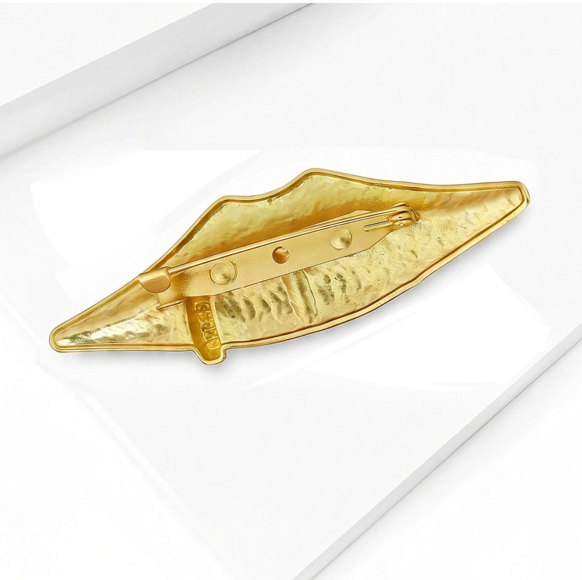 Lip Brooch