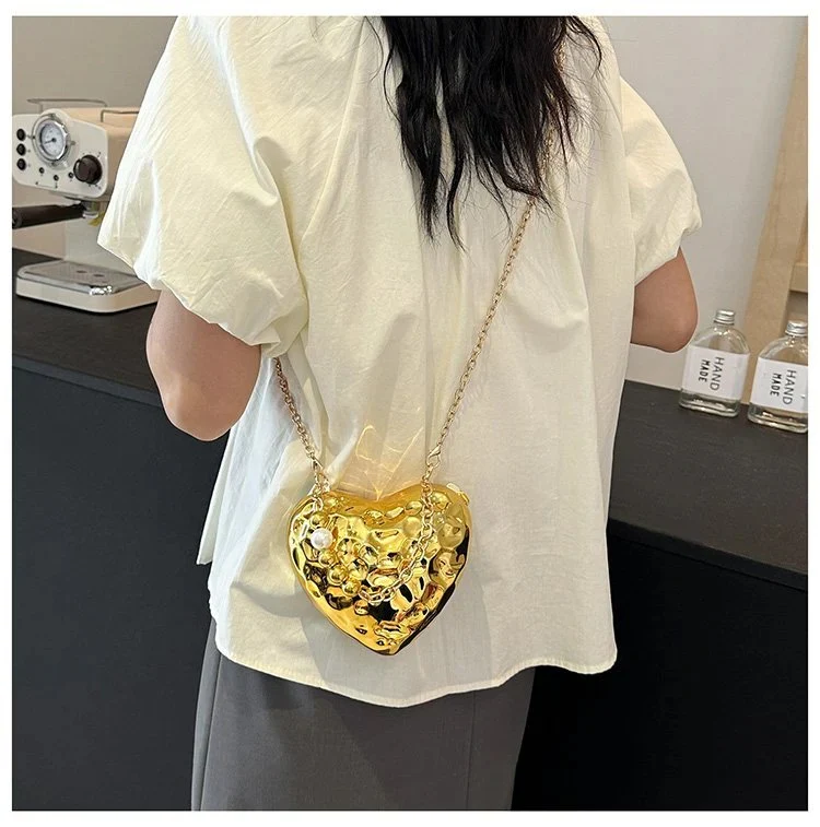 Beaten Heart Sling Bag